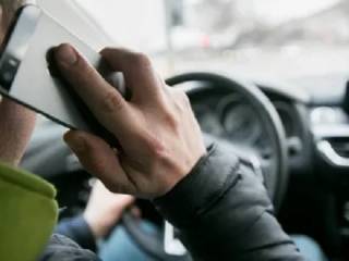 842 водителя оштрафованы за телефонные разговоры за рулем в Шымкенте