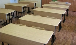 В школе