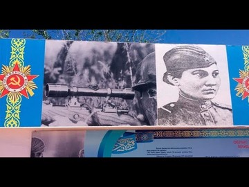 На мемориале победы повесили плакат немецкого снайпера